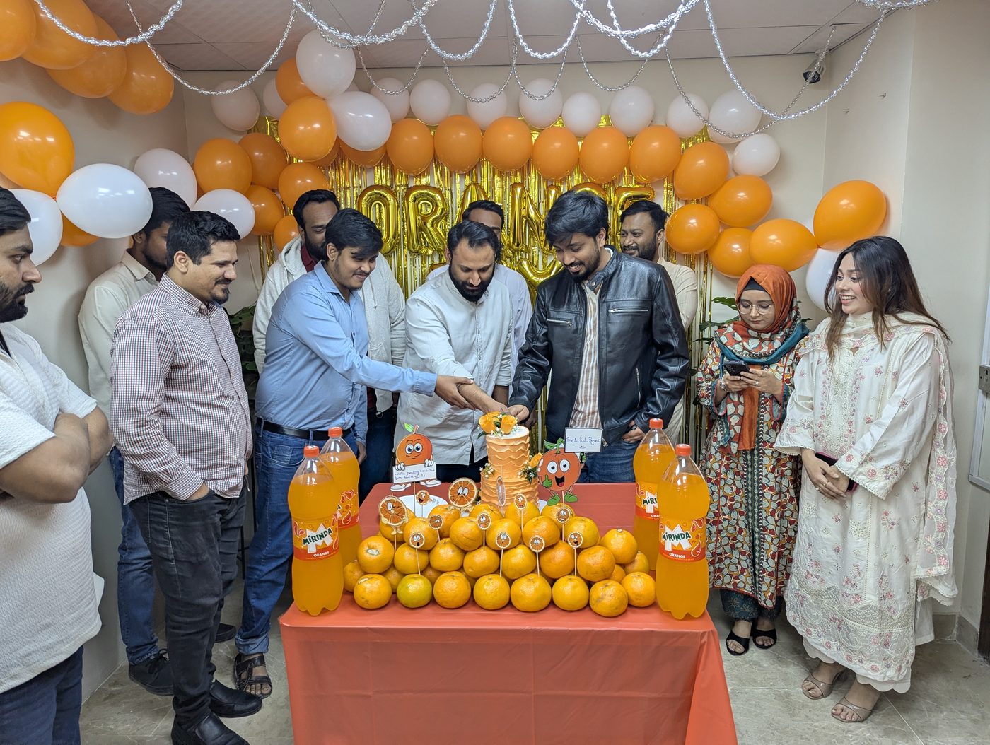 Office birthday party cake cutting
